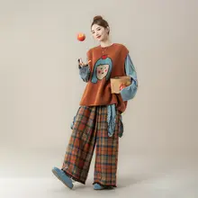 ニットベスト レディース クルーネック 女の子モチーフ オレンジ ヴィンテージ ルーズ 着回し 秋