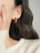 デザイン性豊かな赤いドーナツ型イヤリング【一体式蚊香皿・クリップタイプ】