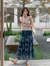 神秘的なブルーのエレガンス ホリデーコーディネート【デザイン性のある透かしタンクトップ・花柄スカート】（セットアップ対応）