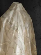 不規則デザインの透け感のある生地【箔金加工・創作ドレス用】