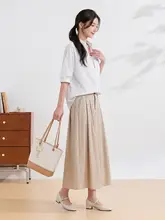 スタイリッシュな通勤向けトップス【韓国風・フェイクツーピースデザイン・スリム効果】（セットアップ対応）