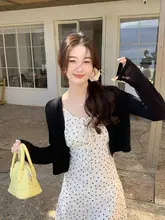 クリームイエローのカーディガン【薄手ニット・UVカット・女性用】（セットアップ対応）