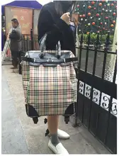 大容量旅行用防水キャリーバッグ【プリント・持ち手付き・多方向ホイール】