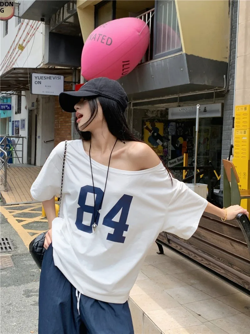 華やかな印花オフショルダートップス：夏レディースコーデに最適なゆったりデザイン
