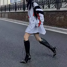 尖った先端のスタッズ付きロングブーツ【細いヒール・ライダース風・ジッパーデザイン】