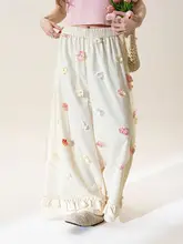 立体花飾りのレースワイドパンツ【春向け・アプリコット色・甘いフリル付き・スタイル】