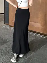 春と夏に万能な女性用ブラックフィッシュテールスカート