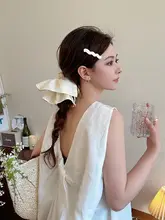 淡い黄色の格子柄ラップスカートヘアゴム【フリル装飾・高級感・おしゃれなポニーテール用】