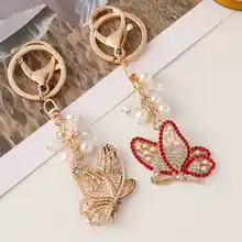 可愛らしいデザインのダイヤモンド付き蝶のキーホルダー【金属製・女性用バッグアクセサリー・幸運のギフト】