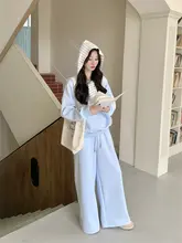 バイカラーストライプ刺繍スウェットシャツとフレアパンツのセットアップ（セットアップ対応）