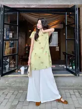 黄色のレトロなボタン付き新中式スタイルの女性用夏服【気品溢れるデザイン・ワイドパンツ・セットアップ対応】
