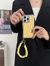 柔らかなイエローの花柄iPhone用ケース【ストラップ付き・斜め掛け対応・レザー製・四隅開孔】