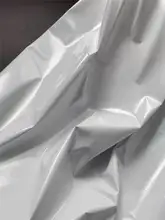 防水性のある薄手PUレザー生地【ホワイト・テクスチャー付き・ドレス、パンツ、ジャケット用】