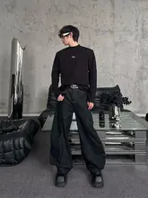 個性派デザインのワイドレッグカジュアルデニムパンツ【プレスト加工・フレア・ロング丈】