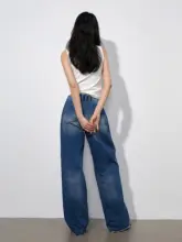 ウォッシュ加工デニムパンツ【V字ウエスト・ワイドレッグ・デザイン性抜群】