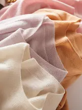 100%ウール seamless ラウンドネック長袖ニットトップ