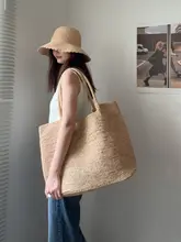 ラフィア草の手編みトートバッグ【ビーチ・肩掛け・ファッショナブル】（セットアップ対応）