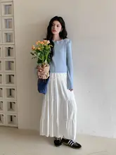 ブルーのリボン付き長袖ニットトップス【春用・薄手・女性用】