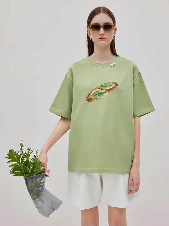 パン印刷の豆緑色ラウンドネック半袖Tシャツ