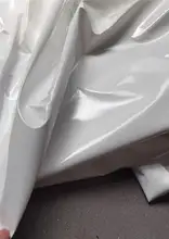 防水性のある薄手PUレザー生地【ホワイト・テクスチャー付き・ドレス、パンツ、ジャケット用】