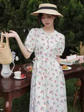 フレンチスタイルのラウンドネックコットンフラワープリントロングドレス