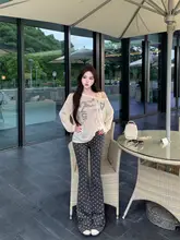 セットアップ 2点セット レディース 長袖Tシャツ ワンショルダー 結び紐 水玉柄 ルーズ カジュアルパンツ ロングパンツ 秋「kumikumi」