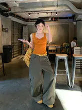 夏用ノースリーブトップス【女性用・オレンジ・タイトフィット・ツイストデザイン】