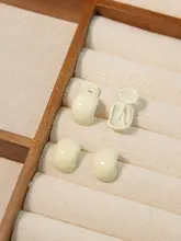 デザイン性の高いモスキートコイル型イヤリング【耳穴不要・ドロップ釉・秋冬用】