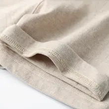 クリームベージュのラウンドネック半袖Tシャツ【新疆産白鹅绒使用・サンドウィンドスタイル】