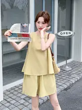 背面透かしデザインのイエロータンクトップとショートパンツ【夏用・カジュアル・小柄対応】（セットアップ対応）