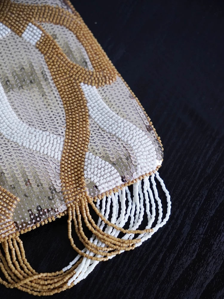 貝殻モチーフのハンド刺繍ビーズクラッチバッグ：ヴィンテージ風の多機能手挽包の実用性と使い分け