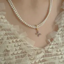 紫色の蝶デザインジルコンパールネックレス【シンプルでエレガント・二重ネックレス・デコルテライン】
