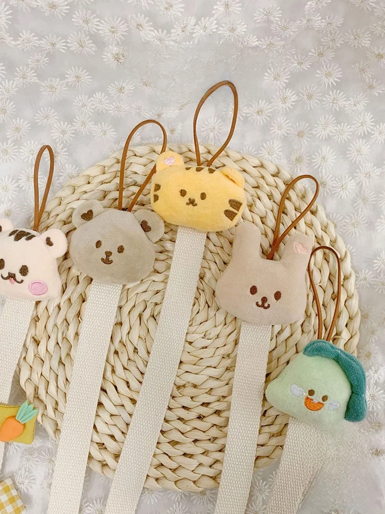 お宮参りに必要なアクセサリーは、これで決める？刺繍ベアデザインのヘアクリップ整理用バンドが注目される理由