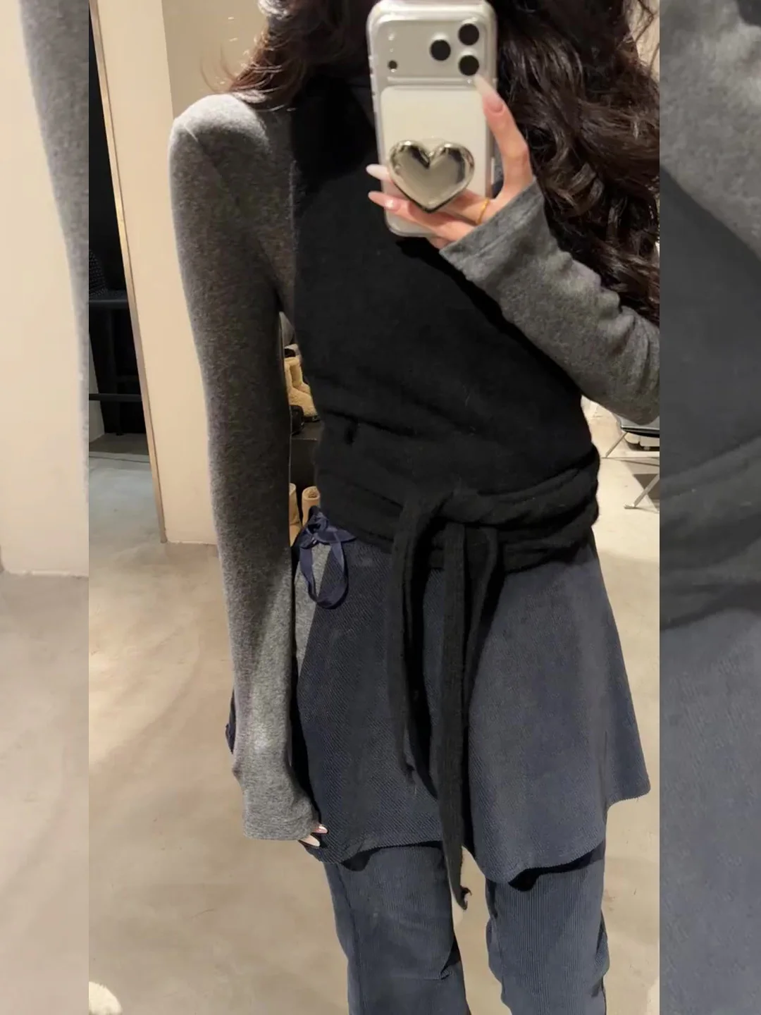 20代後半の女性が今、選ぶべき春のコーデは？レイヤードニットキャミソールとハイウエストスカートパンツのセットアップが答え