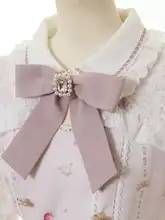 リボンデザインのブローチ【水晶飾り・ピンク・ファッションアクセサリー】