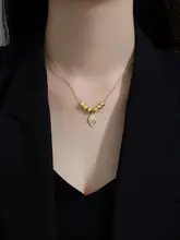 洗練されたデザイン！金色の枝葉モチーフネックレス【ステンレス製・華やかさを引き立てる】