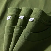 アボカドグリーンの重厚なコットン製ショートスリーブTシャツ【無地・フィット・ユニセックス】