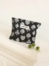 黒の旅行用化粧ポーチ【コンパクト・化粧品・生理用品収納、携帯可能】（セットアップ対応）