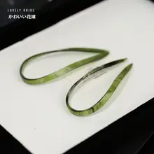 優雅な花飾りのウェディングヘッドアクセサリー【ピンク・精緻な造花・伝統的なデザイン】