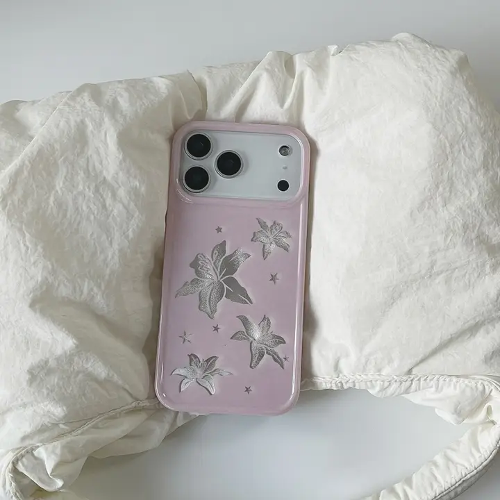 ハンドメイドのフラワーデザインiPhoneケース【百合と星のモチーフ・落下防止】