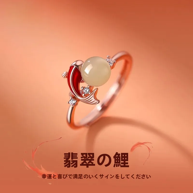 輝く紅色のコイモチーフリング：女性向けプレゼントに最適なファッションジュエリー