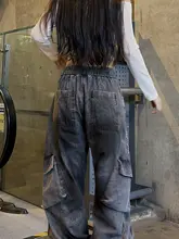 ユニークデザインのダメージデニムパンツ【チェーン付き・ヒップホップスタイル】