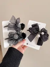 リボンデザインのヘアクリップ【後頭部用・丸みのある形・髪飾り】