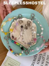 便利なオリジナルデザインのスマホストラップ【二重リング付き・多用途・スタイリッシュ】
