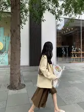 不規則なデザインのハーフスカート【スーツにぴったり】