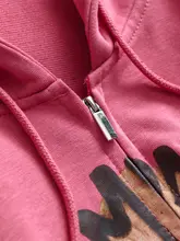 カートゥーンプリントのルーズフィット短丈フード付きジップカーディガン【長袖・レディース・秋用】（セットアップ対応）