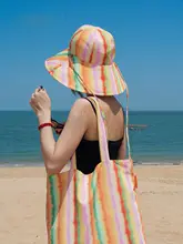 オレンジとイエローのチェック柄リバーシブルフィッシャーハット【UVカット・ブリム広め・女性用】