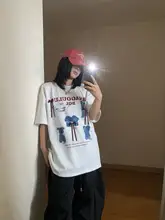 カジュアルなアメリカンスタイルのTシャツ【ユーモラスな犬のデザイン・ゆったりシルエット・カップル向け】