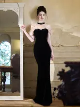 洗練されたデザインの黒いフィッシュテールドレス【エレガント・成人用・パーティー向け】