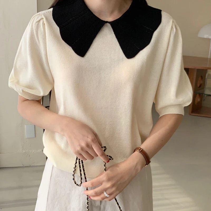 骨格ストレート パフスリーブとは？通勤風の薄手ニットトップスの実際の使い方と特性